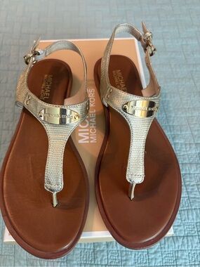 Michael Kors Gold Textured T‑Strap Sandals